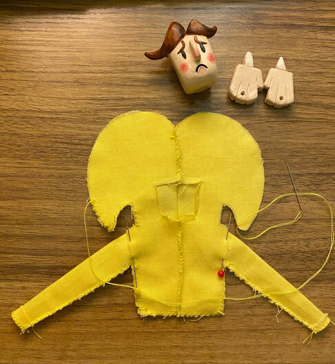 Jester's head and hands. Sewing up his body